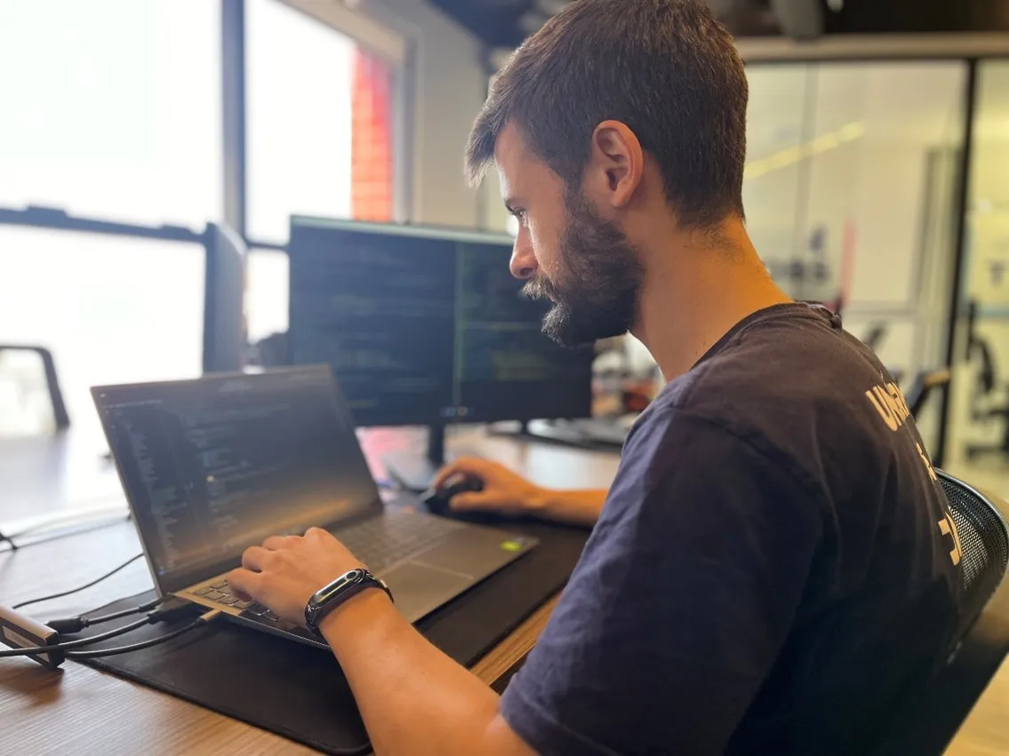 person on computer